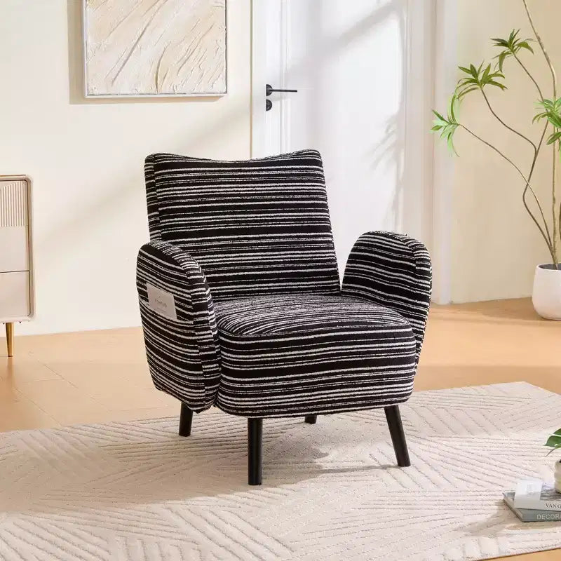 Fauteuil moderne en bouclette avec poche latérale de rangement