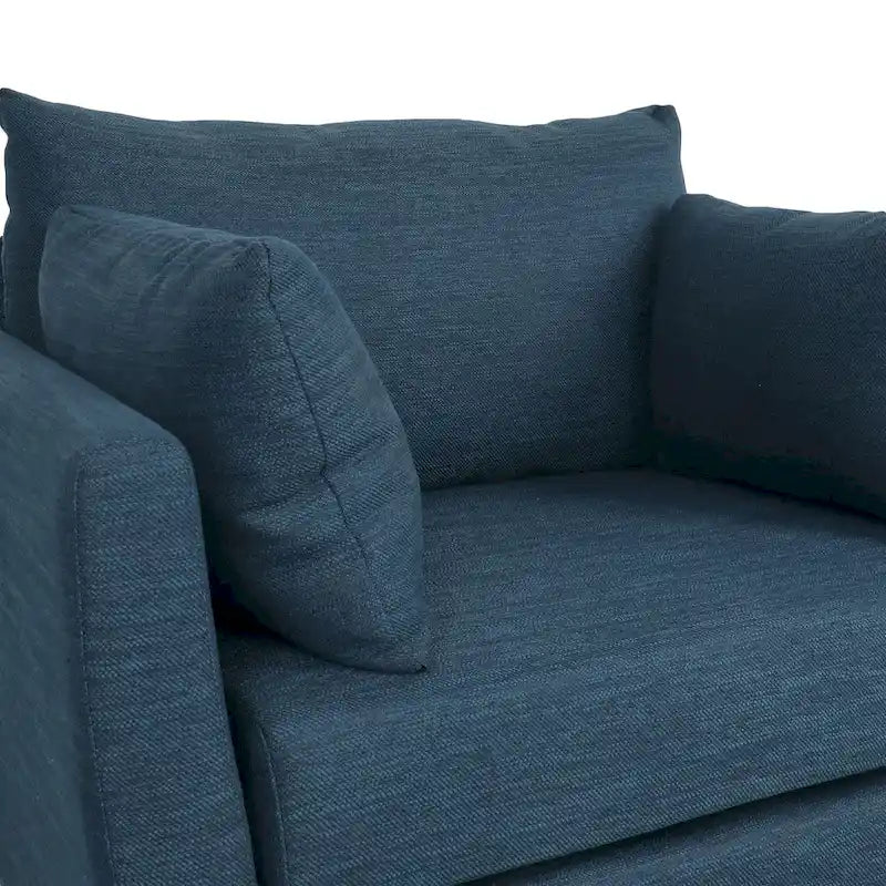Fauteuil club rembourré avec coussins décoratifs